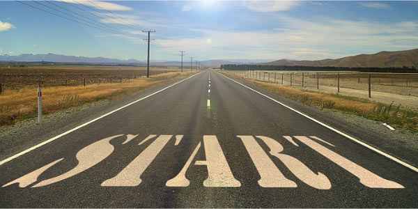 Image of two lane country road with the word 'Start' across the road depicting the start of the disaster recovery activation process.