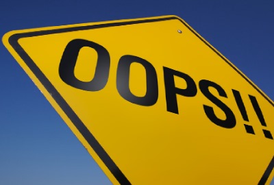 Image of yellow road sign with the word 'OOPS!!', depicting the importance of avoiding management mistakes.