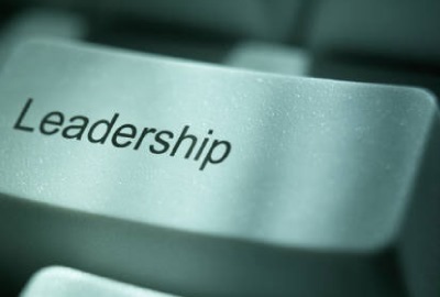 Image of computer key labeled 'leadership' signifying the need to manage crisis perceptions.