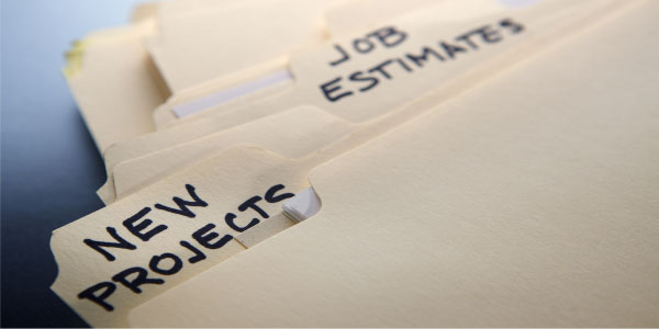 Image of file folders labeled 'new projects' and 'job estimates' depicting the need to make winning project proposals.