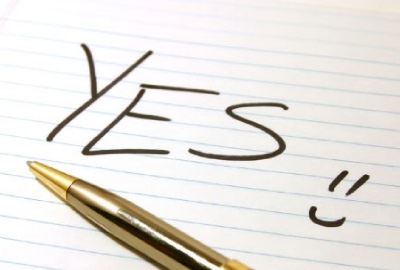 Image of a pad and pen with the word 'Yes!!' representing the need to create project scope templates.