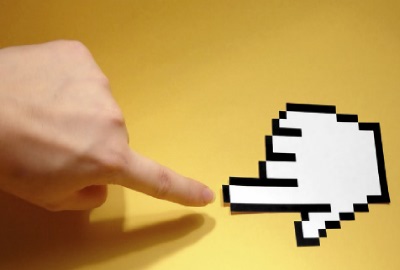 Image of persons finger and cursor hand pointing to each other signifying the need to employ technology standards.